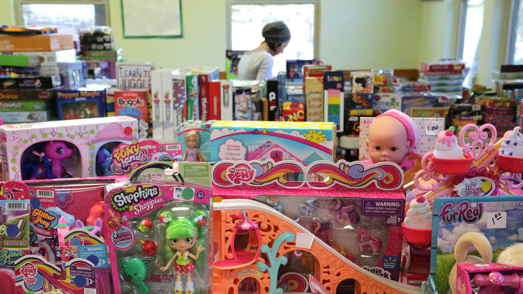 Toys are arranged at Inner City Development the day before its neighborhood Christmas sale.